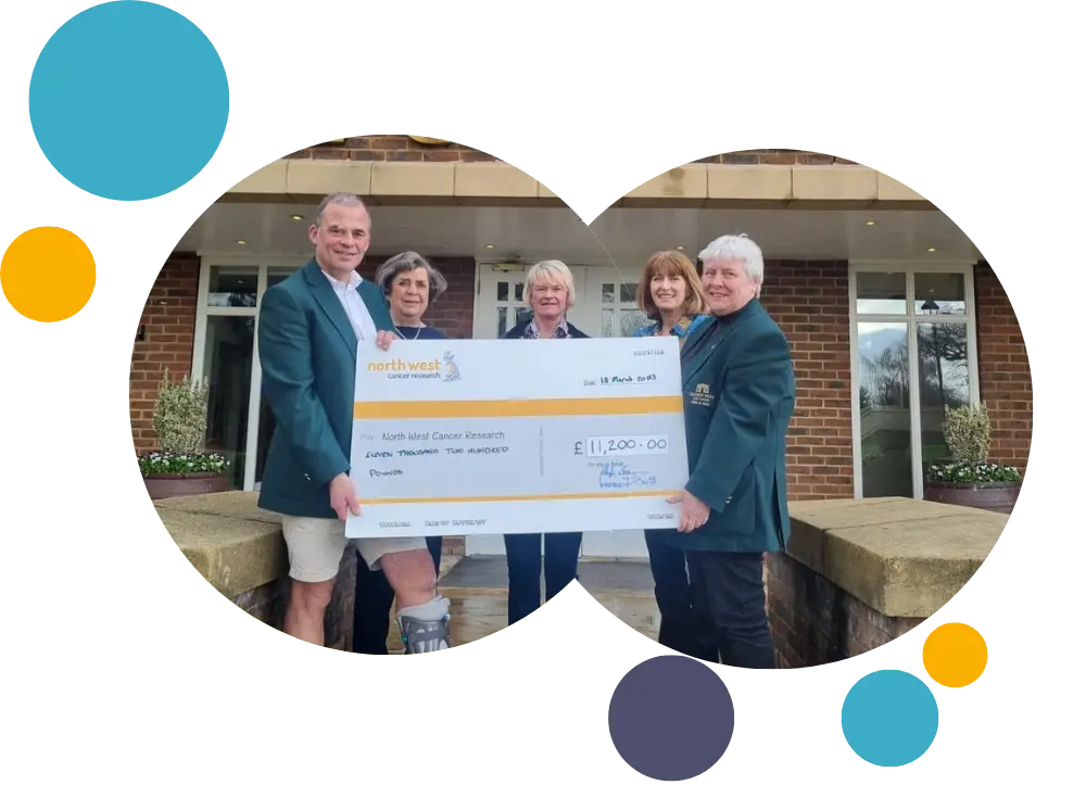 Carden park golf club captains with giant cheque 